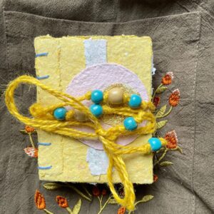 Daybreak handmade paper pocket journal with colourful deckled cover