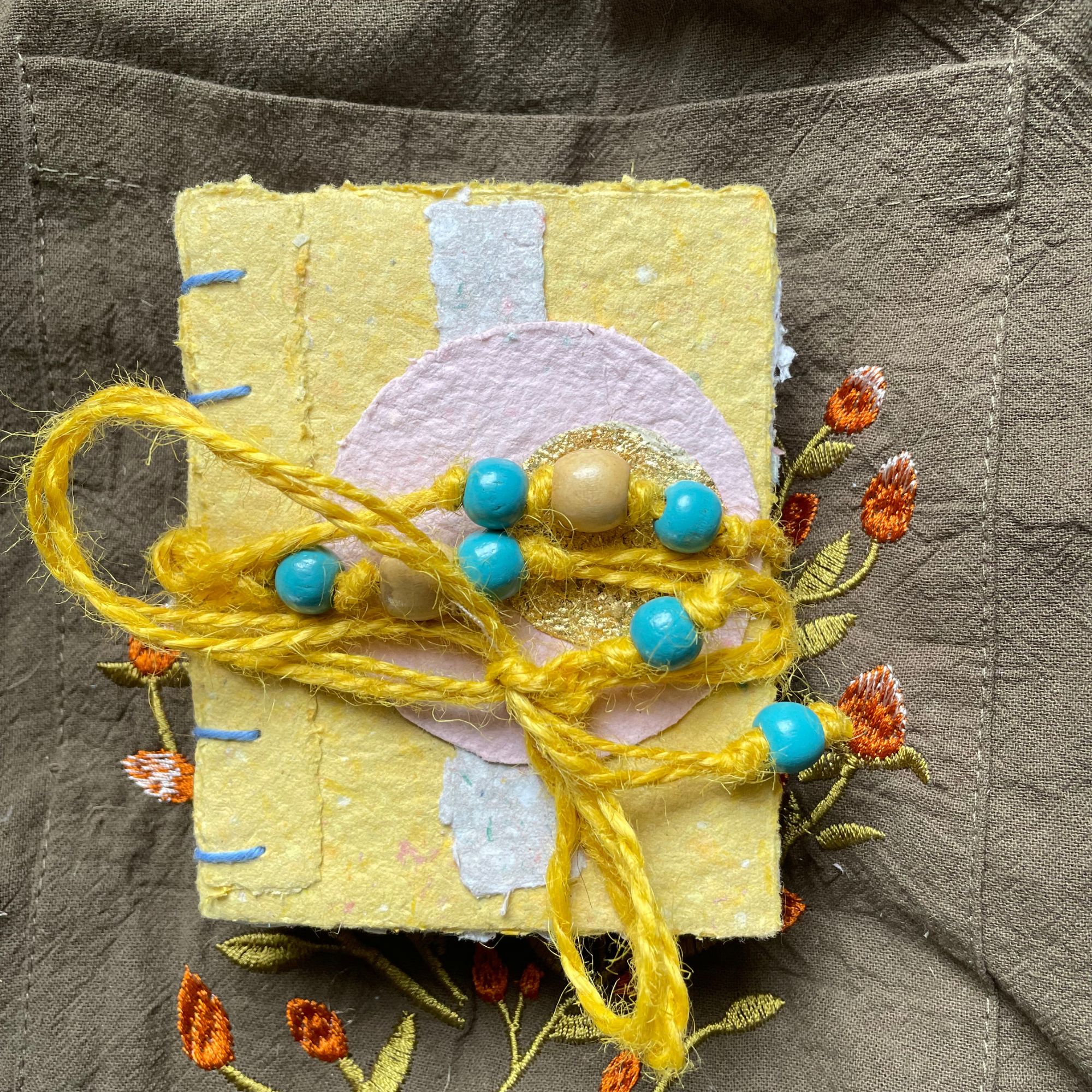 Daybreak handmade paper pocket journal with colourful deckled cover