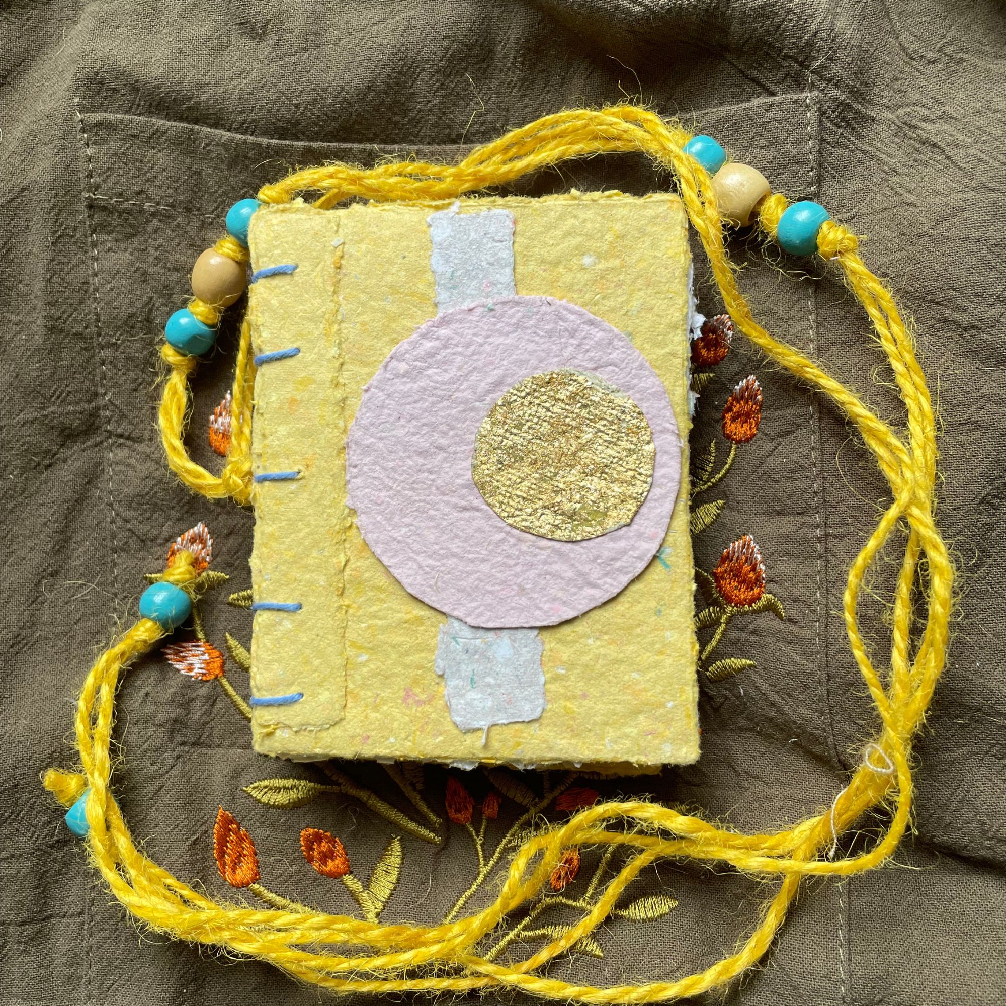 Daybreak handmade paper pocket journal with colourful deckled cover