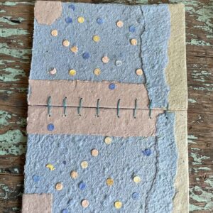 Front and back cover of Salt Air handmade paper collage notebook with Coptic Stitch binding
