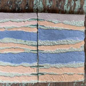 Front and back covers of Tide Mark handmade paper notebook, flat lay open Front and back covers of Tide Mark handmade paper notebook, flat lay open