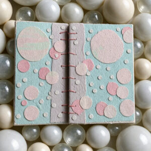Vanilla Cloud Handmade paper Collage Notebook Front and back covers lying open
